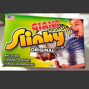 : * New in damaged  box The Original Giant Slinky  Metal Slinky